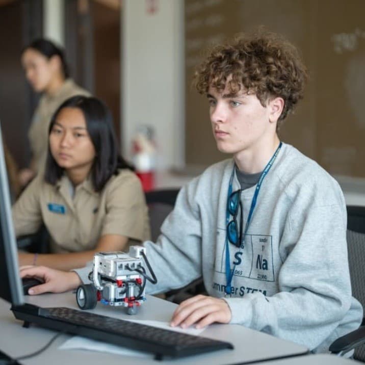 Conor Cavanaugh, founding engineer at Study Share, working at a computer